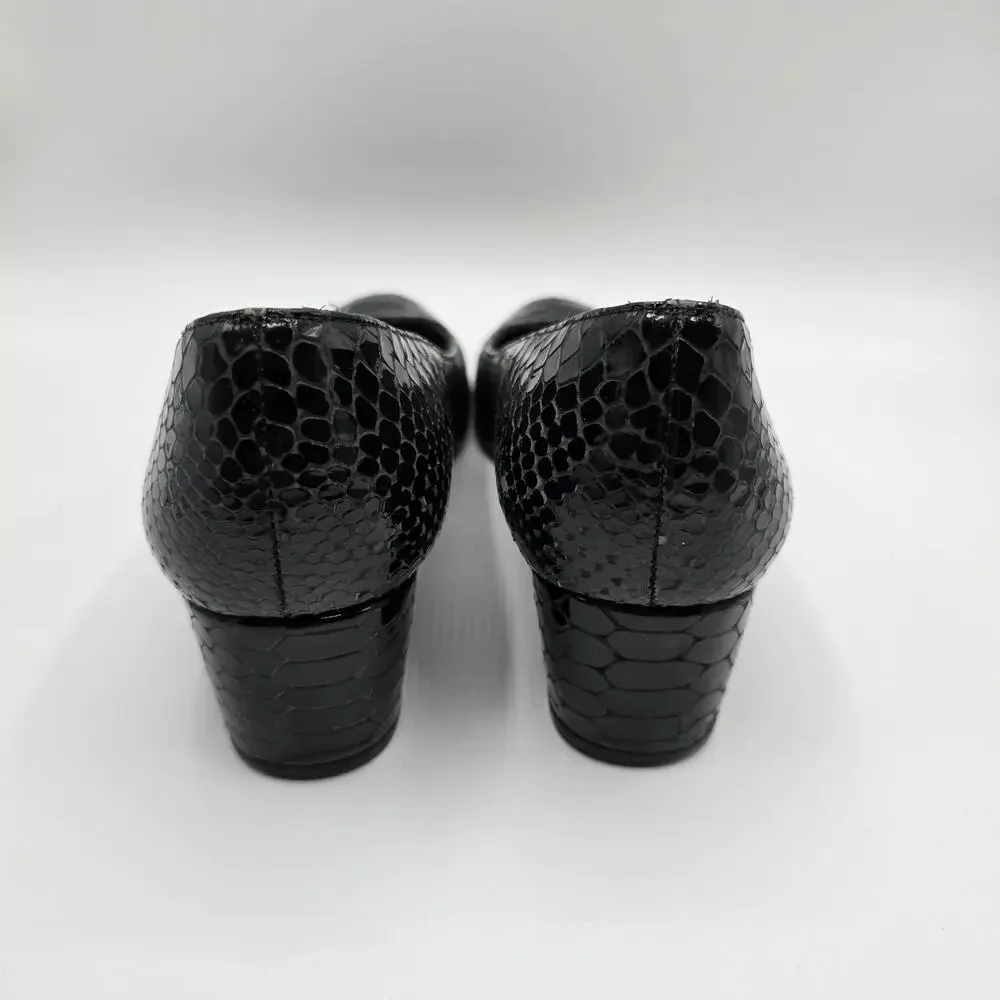 Stuart Weitzman black patent snake print low heel close toe wedges
